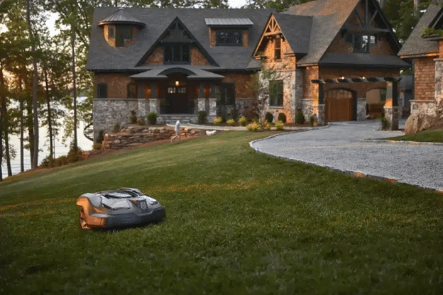 Robotic mower being serviced by technician at Nardella’s workshop in Branford, CT